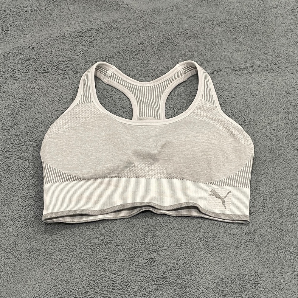 Never worn Puma sports bra. Size medium.